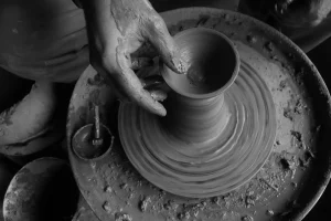 Kashmiri artisans makes different earthen products in his workshop