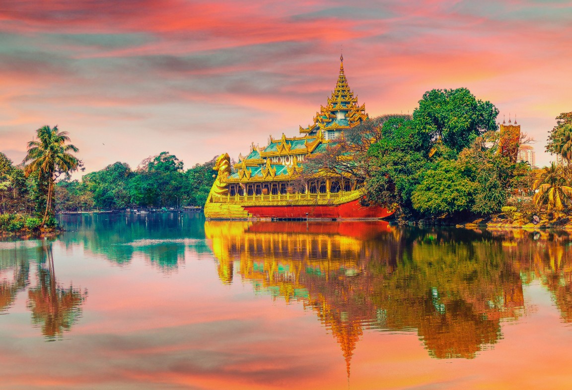 Stunning lakeside temple in Thailand at sunset, showcasing offbeat beauty and cultural charm beyond typical tourist spots.