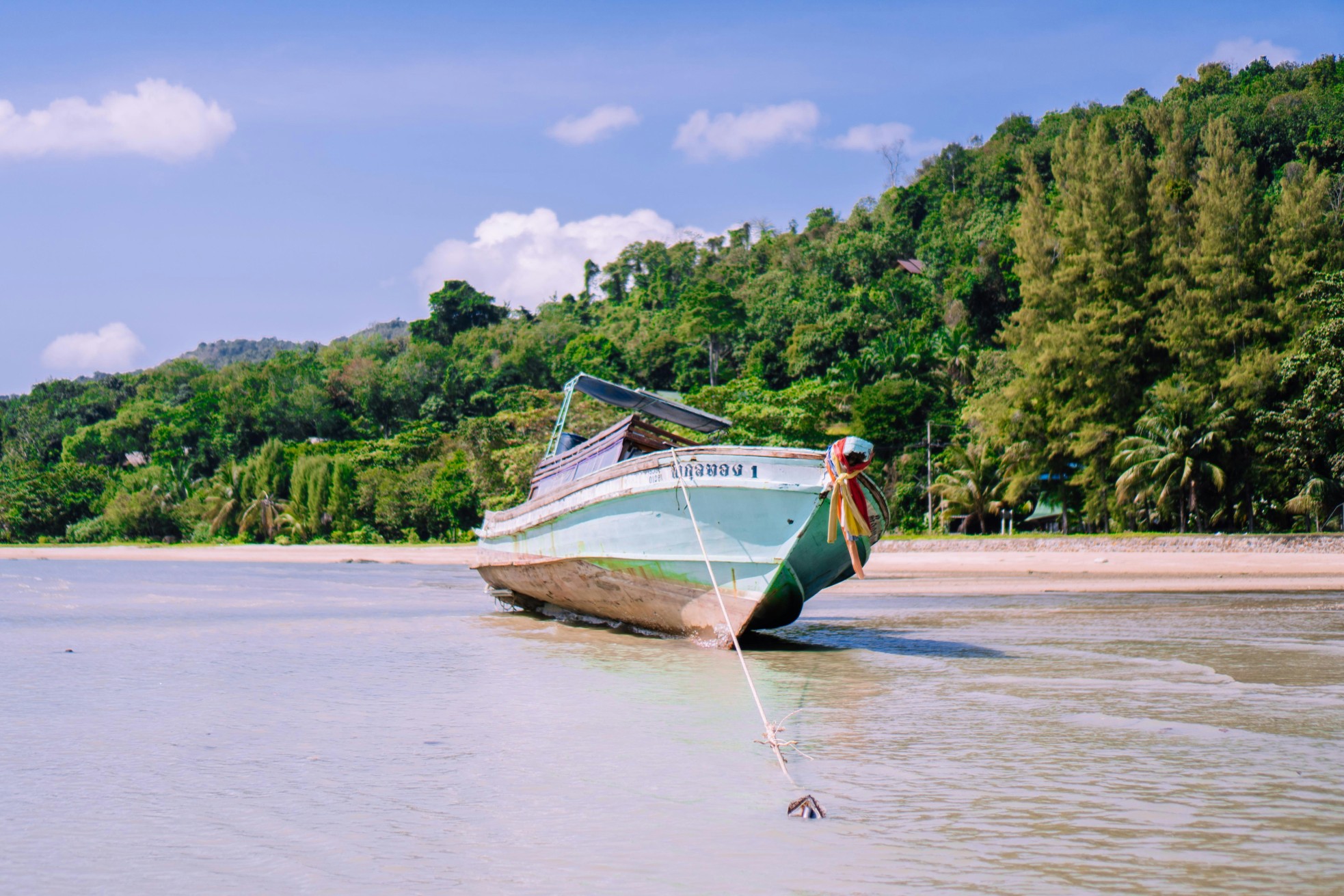 Long-tail boat on the shore of Koh Yao Noi, Thailand.