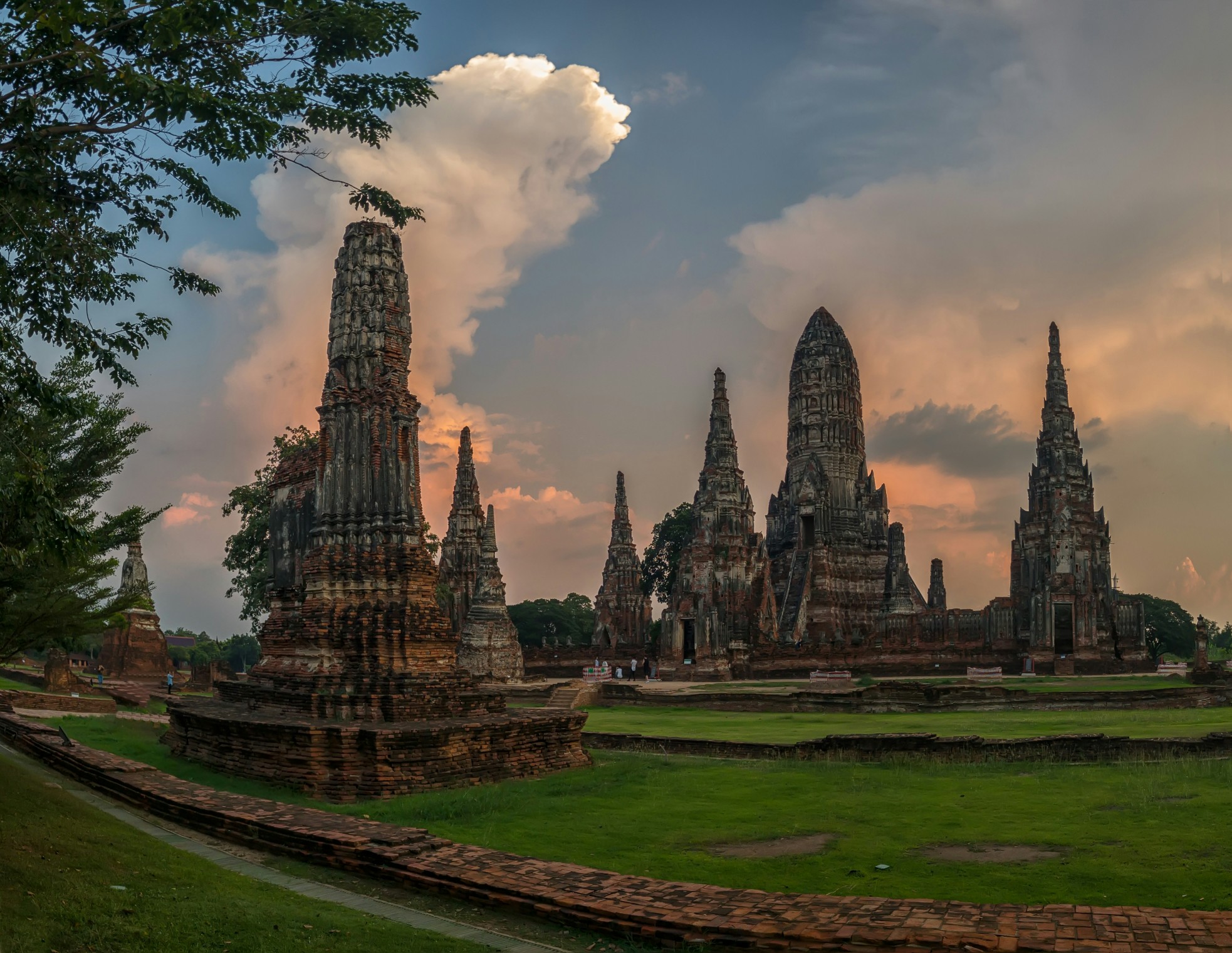 Ancient temple ruins at Wat Chaiwatthanaram in Ayutthaya, Thailand at sunset.