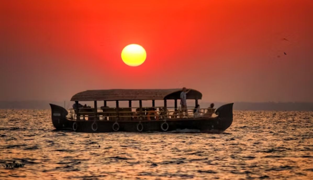 sunset time, boat floating in the river of kerala