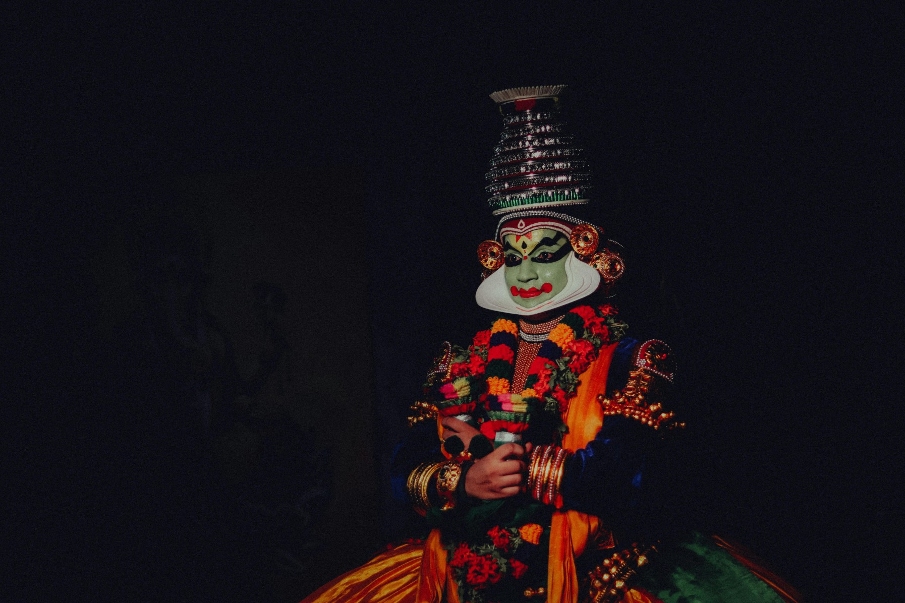 Person in Colorful, Traditional Clothing depicting traditional Kerala Dance