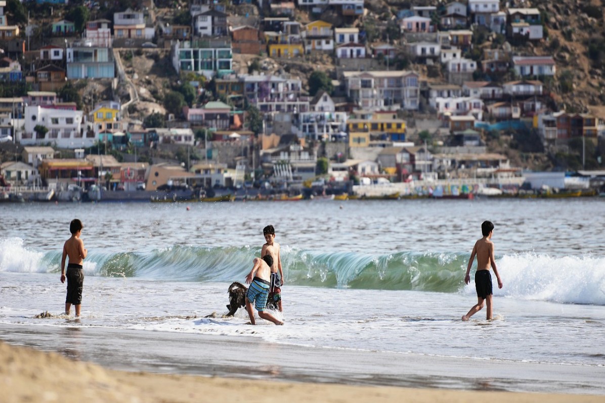 Family enjoying on the Beach of Spain