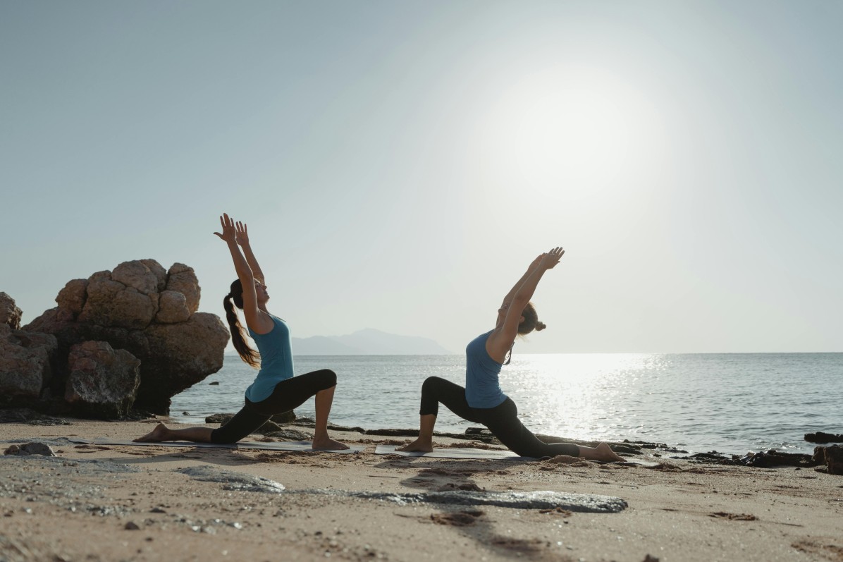 Doing yoga at the beach of goa