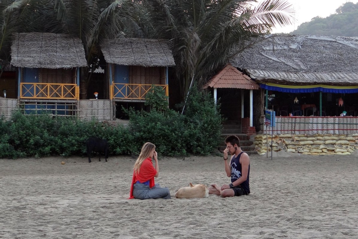 Gokarna , Spiritual villages in India, couple doing yoga at beach