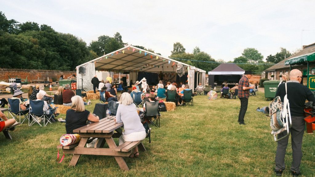 Scenic view of people enjoying food festival.