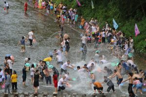 People are splashing water in thai water festival