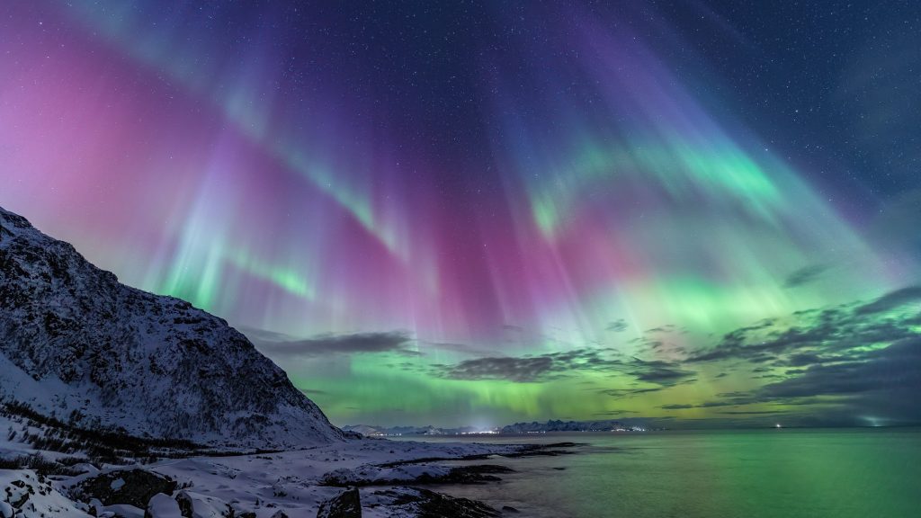 Northern Lights dancing across the Arctic night sky